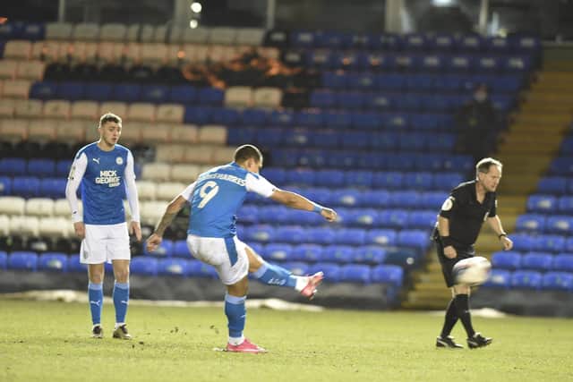 Jonson Clarke-Harris makes it Posh 2, Portsmouth 0. Photo: David Lowndes.