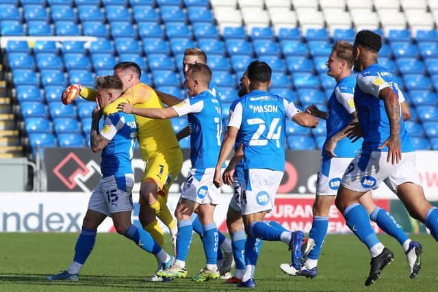 Posh players celebrate the only League One goal scored by Sammie Szmodics this season, on Sptember 19 v Fleetwood.