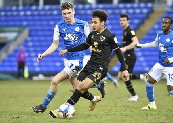 Ethan Hamilton in action for Posh against MK Dons. Photo: David Lowndes.