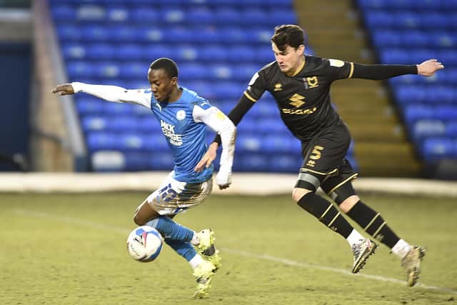 Siriki Dembele in action for Posh against MK Dons. Photo: David Lowndes.