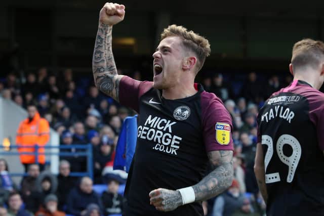 Sammie Szmodics celebrates a goal for Posh at Ipswich last season.