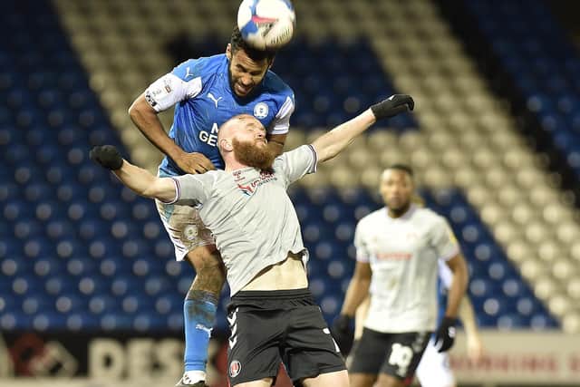 Posh defender Nathan Thompson wins a header in the win over Charlton. Photo: David Lowndes.