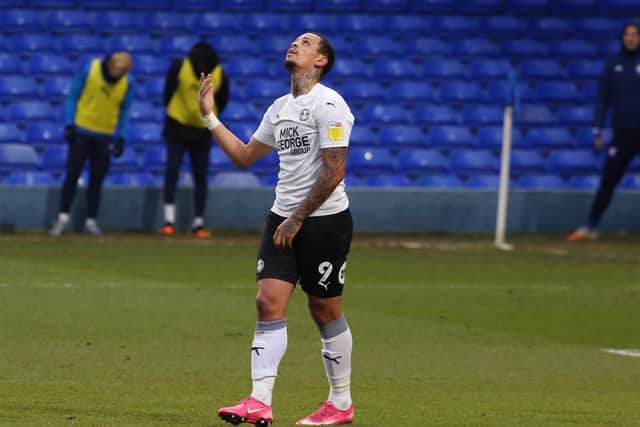 Jonson Clarke-Harris of Peterborough United looks to the skies after missing a penalty against Ipswich Town. Photo: Joe Dent/theposh.com.