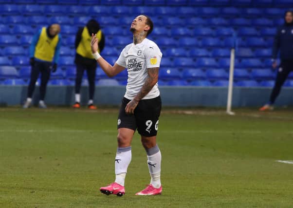 Jonson Clarke-Harris of Peterborough United looks to the skies after missing a penalty against Ipswich Town. Photo: Joe Dent/theposh.com.