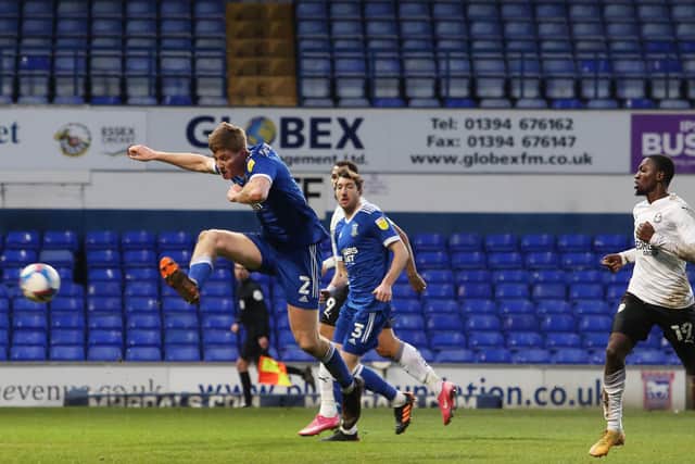 Mark McGuinness of Ipswich Town scores an own goal to hand victory to Posh. Photo: Joe Dent/theposh.com.