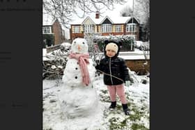 Niks Kļeščov's daughter with her snowman on Eastfield Road.