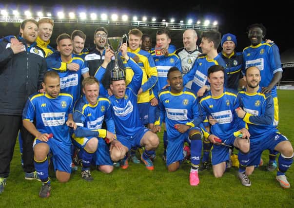 Peterborough Sports after beating Netherton United in the final of the 2016 Northants Junior Cup. Jimmy Dean has the trophy on his head.