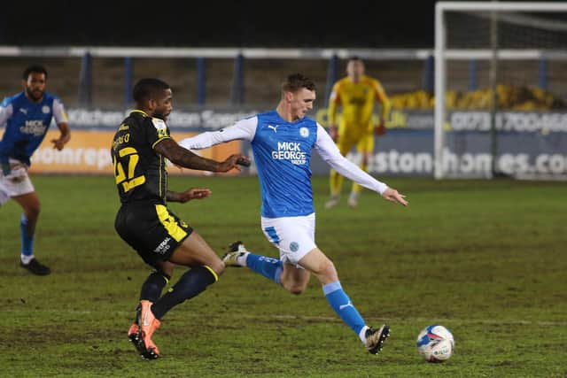 Jack Taylor of Peterborough United is closed down by Abu Ogogo of Bristol Rovers. Photo: Joe Dent/theposh.com.