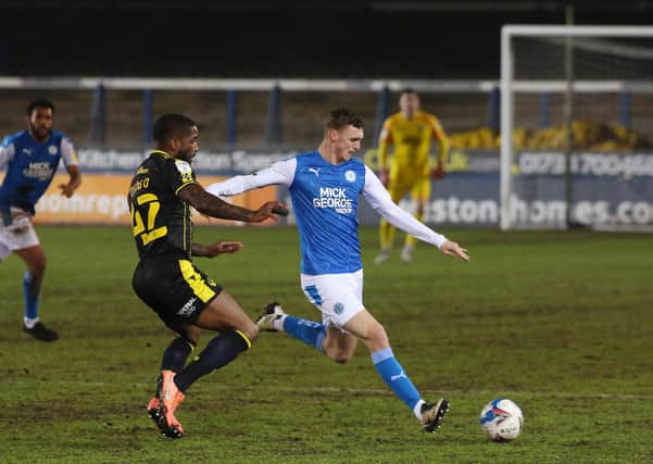 Jack Taylor of Peterborough United is closed down by Abu Ogogo of Bristol Rovers. Photo: Joe Dent/theposh.com.