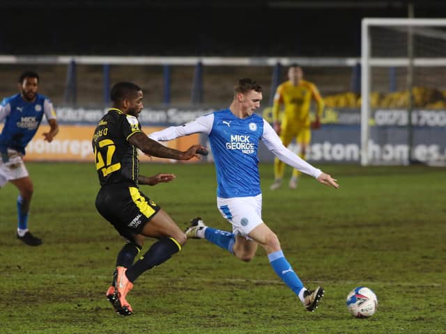 Jack Taylor of Peterborough United is closed down by Abu Ogogo of Bristol Rovers. Photo: Joe Dent/theposh.com.