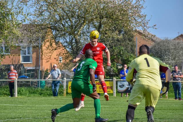 Mark Jones scores the goal at Kidlington which secured the Southern League Central Division One title in 2019.