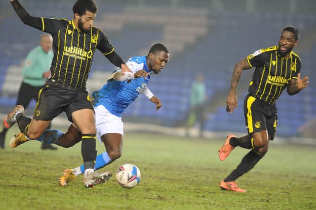 Posh wing-back Idris Kanu is fouled by a Bristol Rovers defender. Photo: David Lowndes.