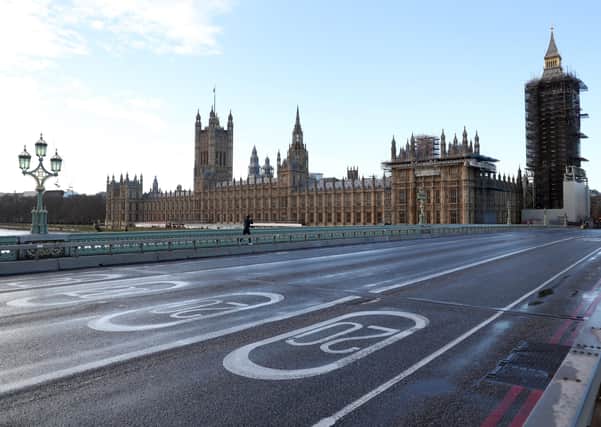 A quiet Westminster bridge by the Houses of Parliament in London. Photo: PA EMN-210129-104959001