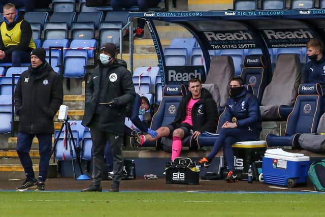 Posh star Jack Taylor receives treatment after being substituted at Shrewsbury. Photo: Joe Dent/theposh.com.