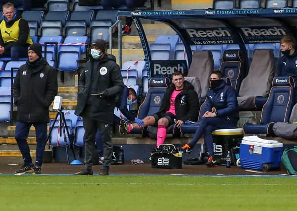 Posh star Jack Taylor receives treatment after being substituted at Shrewsbury. Photo: Joe Dent/theposh.com.