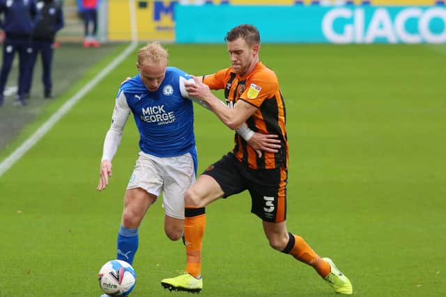 Ryan Broom in action for Posh at Hull earlier this season.
