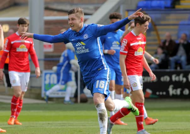 Harry Beautyman celebrates a goal for Posh in a 3-0 win over Crewe.
