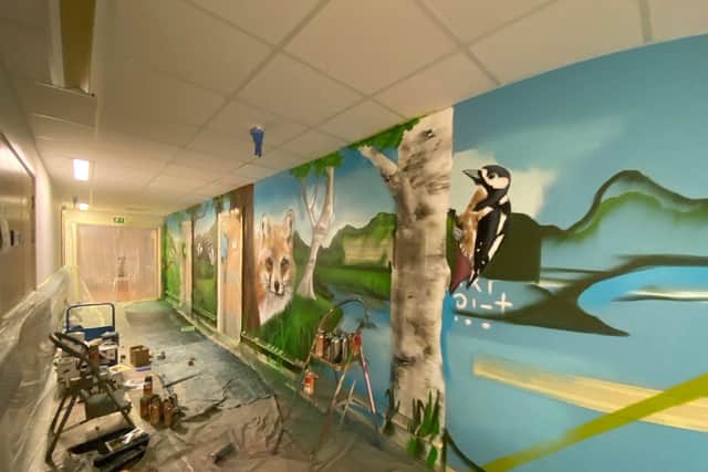 A mural being created