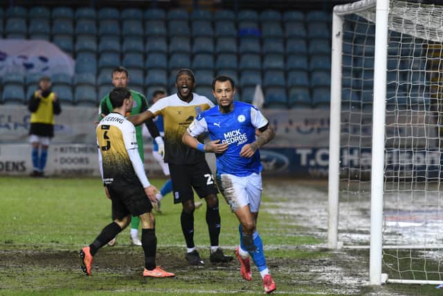 Jonson Clarke-Harris celebrates his goal against Crewe. Photo: David Lowndes.