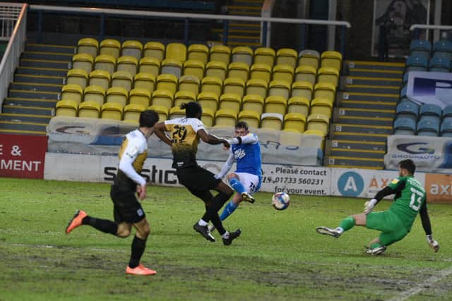 Sammie Szmodics fires Posh ahead against Crewe. Photo: David Lowndes.