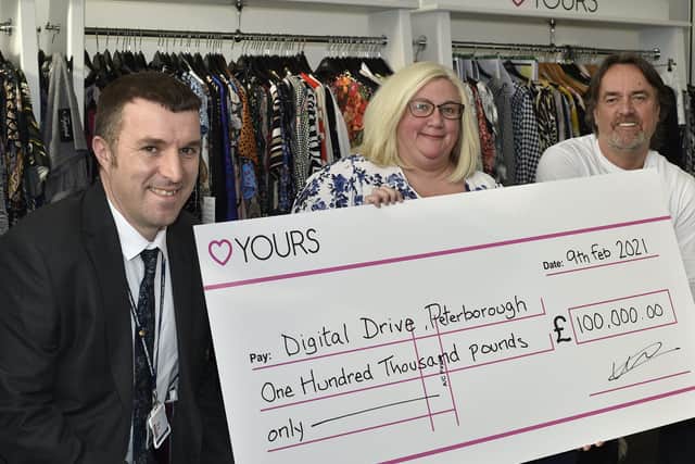 Jonathan Lewis, PCC Director of Education receives a £100,000 cheque for laptops for schools from Yours Clothing founder and CEO Andrew Kiliingsworth and HR director Kay Clay EMN-210902-123957009