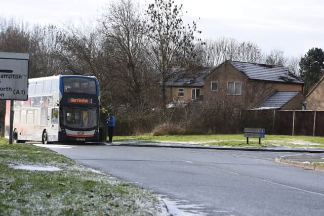 A bus stopped near Linnet in Orton Wistow EMN-211002-171140009
