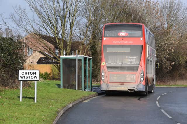 A bus stopped near Linnet in Orton Wistow EMN-211002-171140009