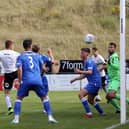 Brad Rolt (white) scores for Posh at Stamford in the summer.