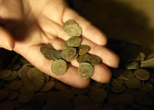 Part of a Roman coin hoard. There were 18 treasure trove items found in Cambridgeshire and Peterborough in 2019. EMN-211102-180737001