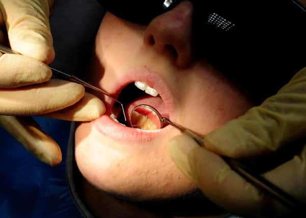 Peterborough children get tens of thousands fewer dental treatments. Photo: PA EMN-211202-103157001