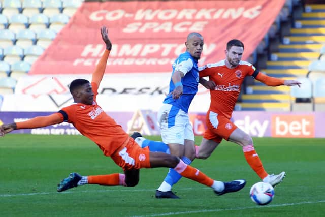 Jonson Clarke-Harris in action for Posh against Blackpool earlier this season.