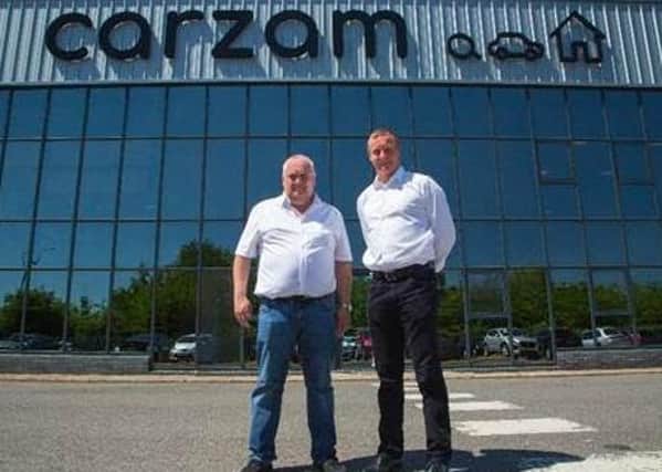 From left, Carzam founders Peter Waddell and John Bailey.
