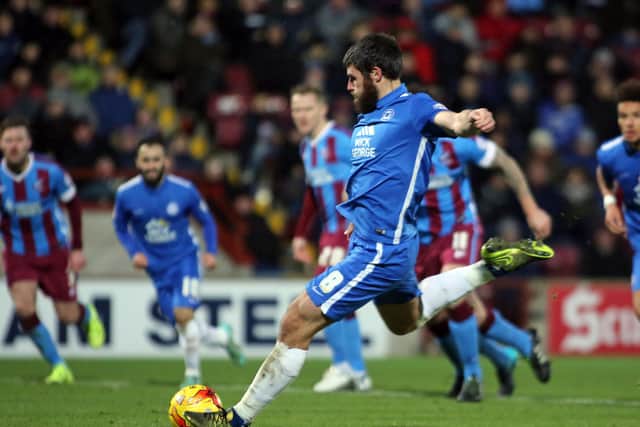 Michael Bostwick of Peterborough United scores from the panalty spot to make it 0-2 - Mandatory byline: Joe Dent/JMP - 07966 386802 - 28/11/2015 - FOOTBALL - Glanford Park - Scunthorpe, England - Scunthorpe United v Peterborough United - Sky Bet League One EMN-150112-101532002
