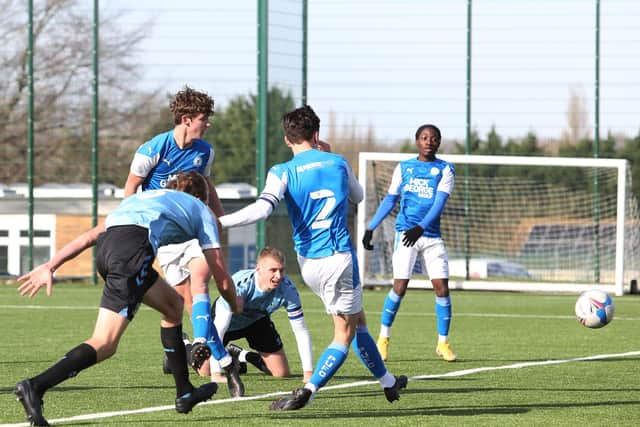 Charlie O'Connell sweeps home the Posh Youth team equaliser against Southend. Photo: Joe Dent/theposh.com.