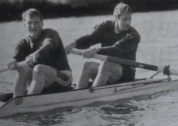 Olympic gold medal winners Steve Redgrave and Matthew Pinsent in action on the River Nene.