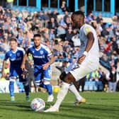 Mo Eisa scores from the penalty spot for Posh at Gillingham last season.