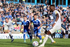 Mo Eisa scores from the penalty spot for Posh at Gillingham last season.