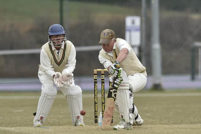 Peterborough Town CC chairman Brian Howard in action.