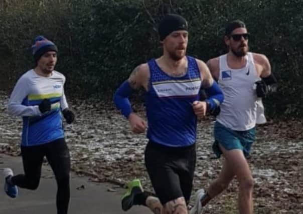 From left, Aaron Scott, Alex Gibb and Phil Martin running around Lynch Wood Business Park. They are more scocially distant than the photo would suggest!