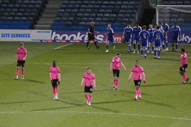 Peterborough United players look dejected after Gillingham score the opening goal of the game. Photo: Joe Dent/theposh.com