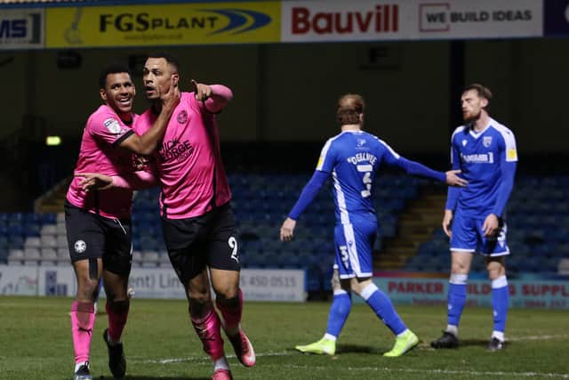 Jonson Clarke-Harris (right) celebrates a goal at Gillingham with Nathan Thompson. Photo: Joe Dent/theposh.com.
