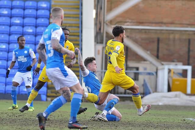Sammie Szmodics opens the scoring for Posh against AFC Wimbledon. Photo: David Lowndes.