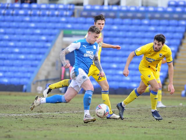 Sammie Sxmodics is about to score his second goal for Posh against AFC Wimbledon. Photo: David Lowndes.