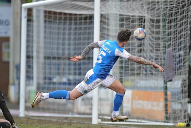 Sammie Szmodics missed this tricky chance to complete a Posh hat-trick against AFC Wimbledon.  Photo: David Lowndes.