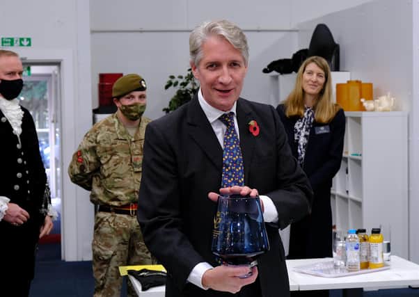 Photocentric managing director with the Queen's Award trophy last year.