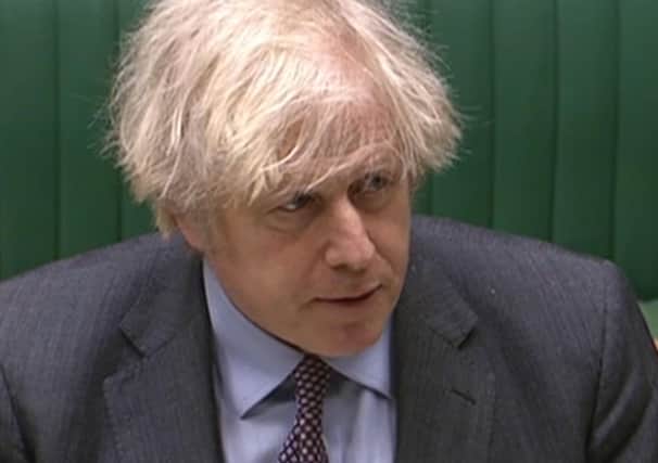 Prime Minister Boris Johnson giving his speech to Parliament,  in the House of Commons,  about setting out the road map for easing coronavirus restrictions across England.
