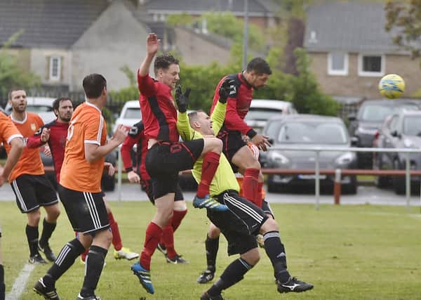 Action from a PDFL Cup Final at Candy Street.