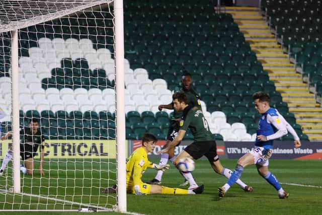 Sammie Szmodics of Peterborough United scores the opening goal of the game against Plymouth Argyle. Photo: Joe Dent/theposh.com.