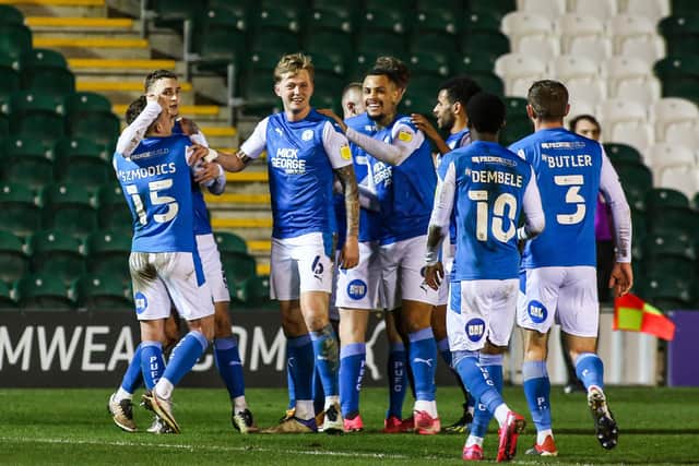 Posh players celebrate Jack Taylor's superb goal at Plymouth. Photo: Joe Dent/theposh.com