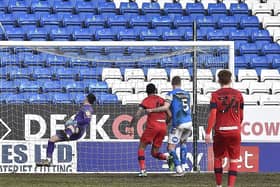 A Wigan corner sails over Posh galkeeper Christy Pym's head to give the visitors the lead. Photo: David Lowndes.